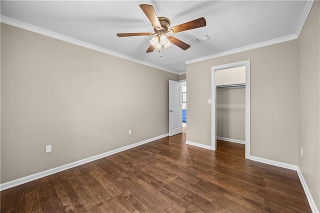 426 Devon Dr, Mandeville, LA 70448 - unfurnished bedroom with wood finished floors, ornamental molding, a ceiling fan, and a closet