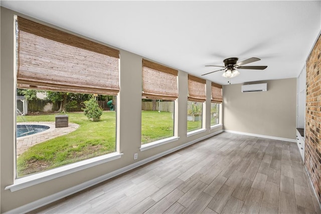 426 Devon Dr, Mandeville, LA 70448 - unfurnished sunroom featuring a wall mounted AC and wood finished floors