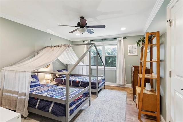 7320 General Haig St, New Orleans, LA 70124 - bedroom with crown molding, wood finished floors, recessed lighting, and ceiling fan