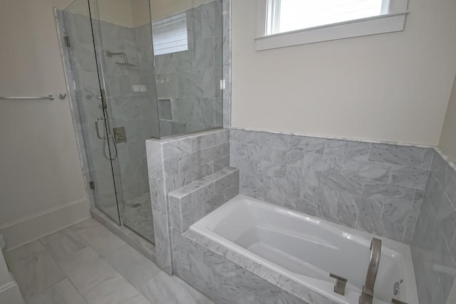 412 N Miro St, New Orleans, LA 70119 - full bath with a stall shower, a bath, and marble look tiles