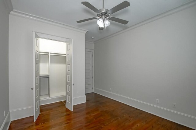 412 N Miro St, New Orleans, LA 70119 - unfurnished bedroom featuring ornamental molding, wood finished floors, a closet, and a ceiling fan