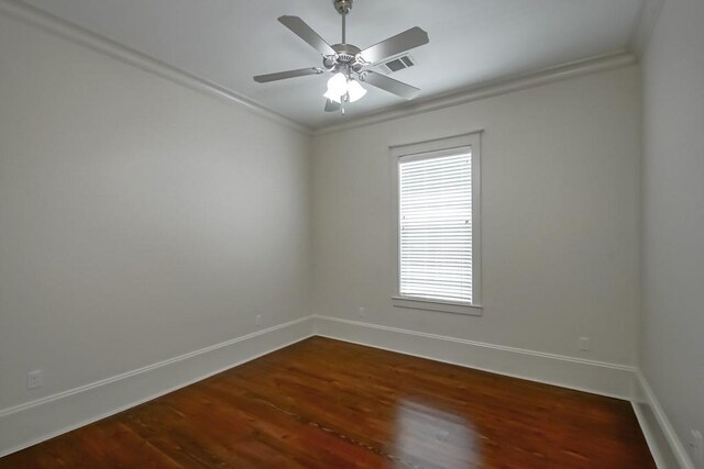 412 N Miro St, New Orleans, LA 70119 - empty room featuring ornamental molding, dark wood-type flooring, and a ceiling fan