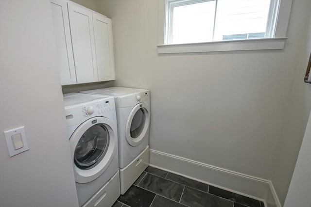 412 N Miro St, New Orleans, LA 70119 - washroom with washing machine and dryer, cabinet space, and healthy amount of natural light