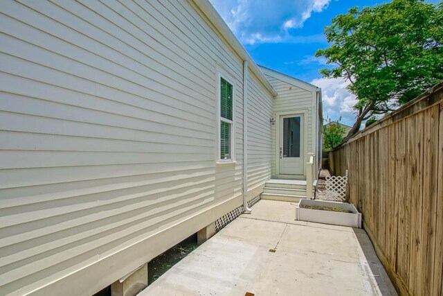 412 N Miro St, New Orleans, LA 70119 - view of side of home with a patio