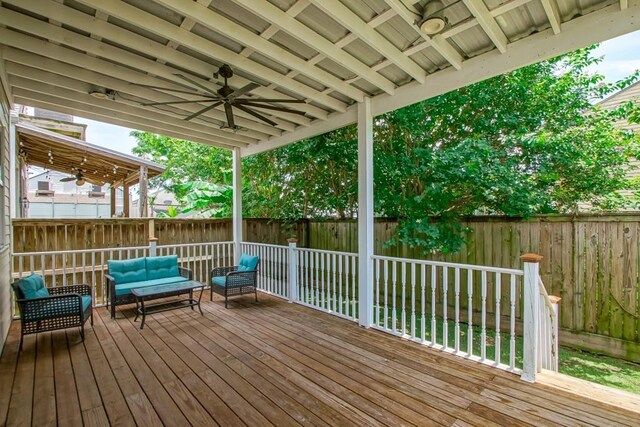 412 N Miro St, New Orleans, LA 70119 - wooden terrace featuring ceiling fan, a fenced backyard, and outdoor lounge area