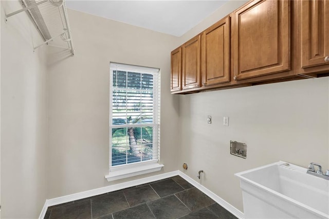 147 Jesuit Bend Dr, Belle Chasse, LA 70037 - laundry room with gas dryer hookup, cabinet space, and hookup for a washing machine
