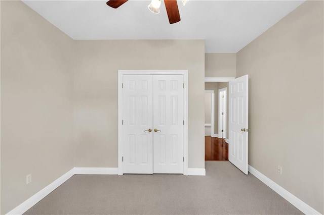 147 Jesuit Bend Dr, Belle Chasse, LA 70037 - unfurnished bedroom featuring carpet floors, a closet, and ceiling fan