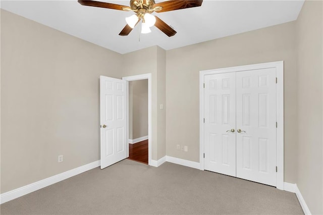 147 Jesuit Bend Dr, Belle Chasse, LA 70037 - unfurnished bedroom featuring carpet flooring, a closet, and a ceiling fan