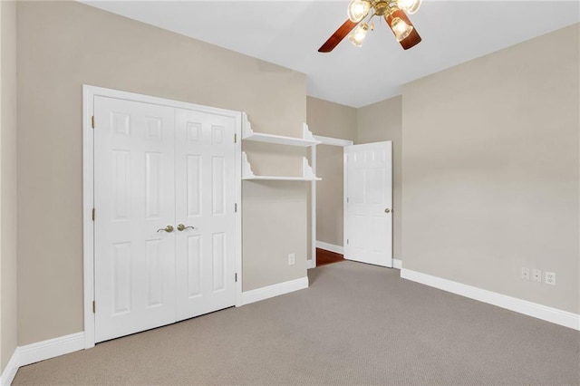 147 Jesuit Bend Dr, Belle Chasse, LA 70037 - unfurnished bedroom featuring carpet floors, a closet, and a ceiling fan