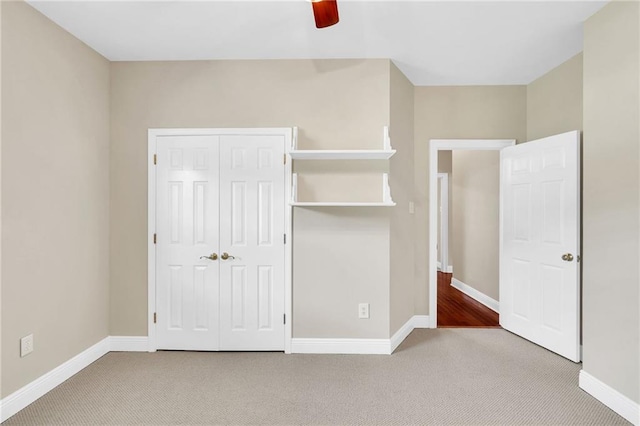 147 Jesuit Bend Dr, Belle Chasse, LA 70037 - unfurnished bedroom with carpet flooring, a closet, and ceiling fan