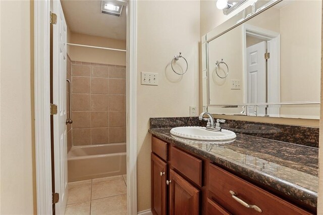 3632 N Hullen St, Metairie, LA 70002 - full bath with vanity, tile patterned floors, and bathing tub / shower combination