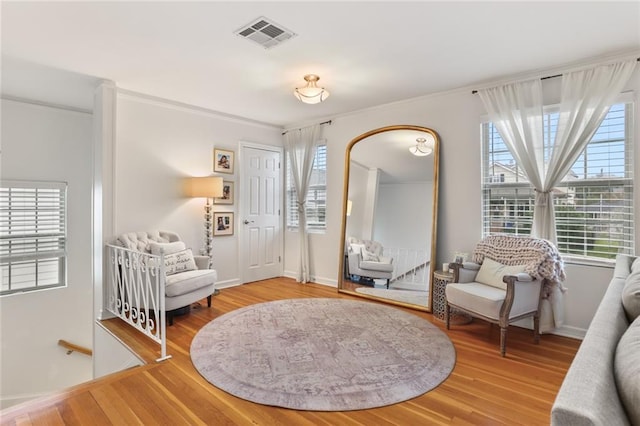 665254 General Diaz St, New Orleans, LA 70124 - living area featuring wood finished floors and ornamental molding