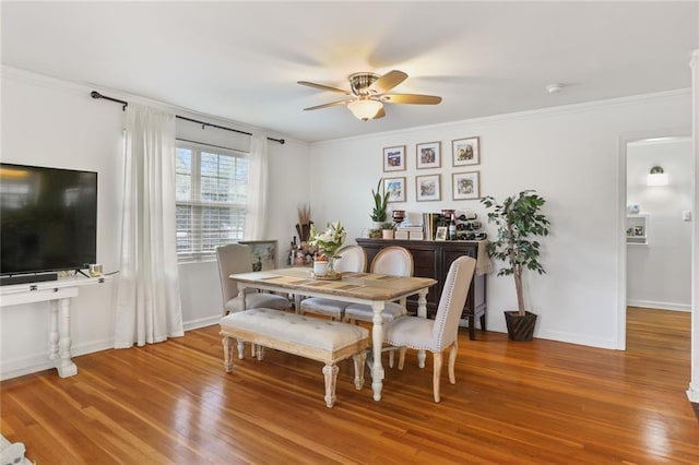 665254 General Diaz St, New Orleans, LA 70124 - dining room with a ceiling fan, wood finished floors, and crown molding
