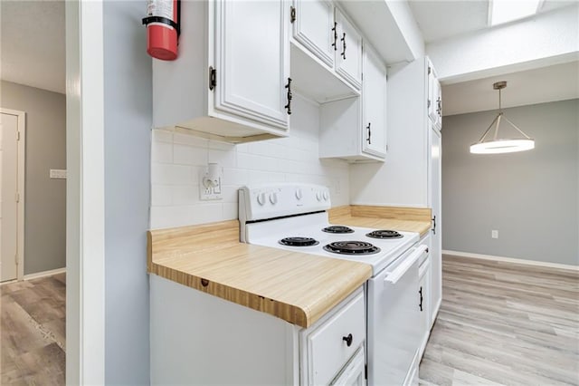101 Wilbourn Blvd Unit 102, Lafayette, LA 70506 - kitchen featuring white electric stove, light wood finished floors, decorative backsplash, and white cabinetry