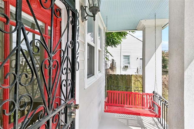 8426 Green St, New Orleans, LA 70118 - gate featuring covered porch
