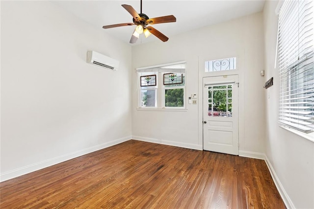 8426 Green St, New Orleans, LA 70118 - doorway to outside featuring a wall mounted air conditioner, wood finished floors, and ceiling fan