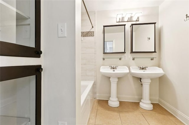 8426 Green St, New Orleans, LA 70118 - bathroom with shower / tub combination and tile patterned flooring