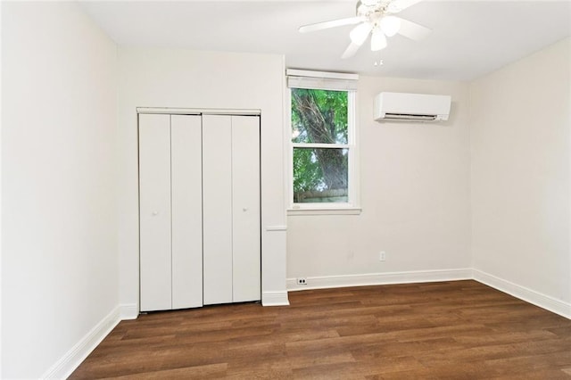 8426 Green St, New Orleans, LA 70118 - unfurnished bedroom featuring a wall mounted air conditioner, wood finished floors, a closet, and a ceiling fan