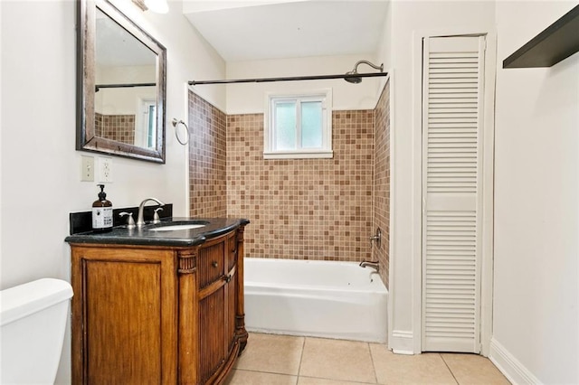 8426 Green St, New Orleans, LA 70118 - bathroom featuring a closet, tub / shower combination, tile patterned flooring, and vanity