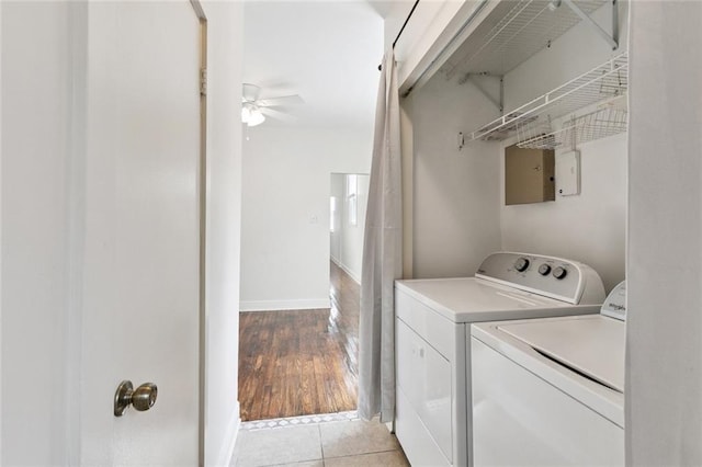 8426 Green St, New Orleans, LA 70118 - laundry area with separate washer and dryer, a ceiling fan, and light tile patterned flooring