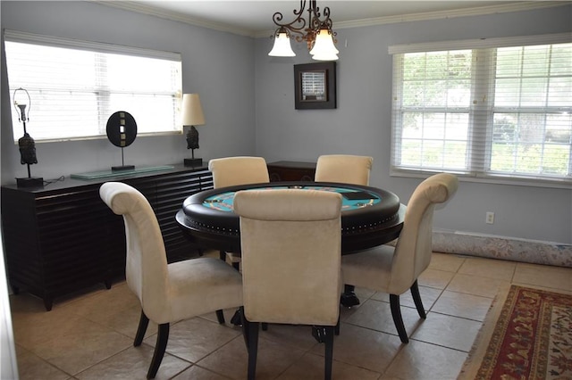 5501 Chatham Dr, New Orleans, LA 70112 - dining area featuring light tile patterned floors and ornamental molding