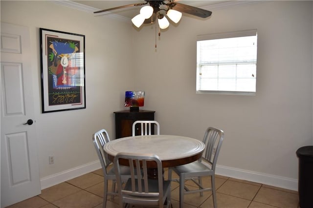 5501 Chatham Dr, New Orleans, LA 70122 - dining area with crown molding, light tile patterned floors, and a ceiling fan