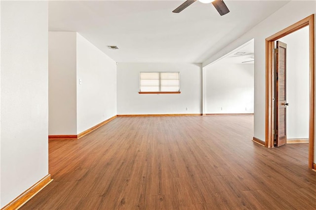 1709 Francis Ave, Metairie, LA 70003 - empty room with ceiling fan and wood finished floors