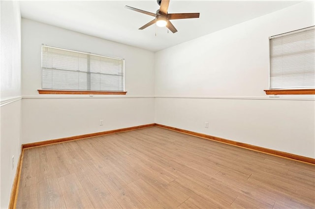 1709 Francis Ave, Metairie, LA 70003 - empty room with wood finished floors and a ceiling fan