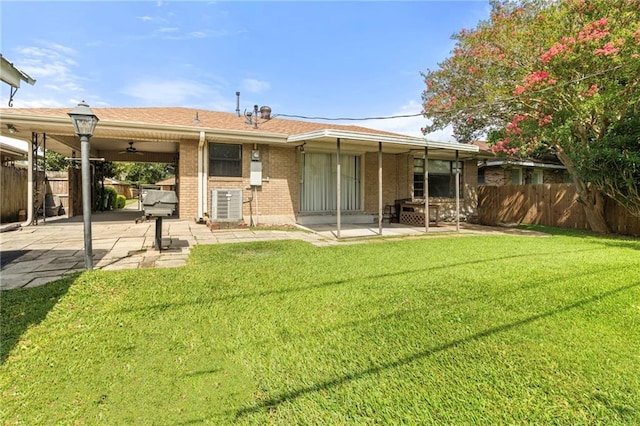 1709 Francis Ave, Metairie, LA 70003 - rear view of property with a patio area, a fenced backyard, ceiling fan, and brick siding