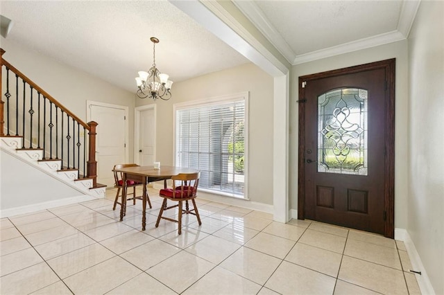 4000 Kawanee Ave, Metairie, LA 70002 - entryway with a chandelier, plenty of natural light, light tile patterned flooring, stairs, and ornamental molding