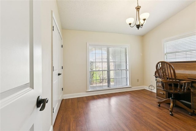 4000 Kawanee Ave, Metairie, LA 70002 - office area featuring a chandelier, wood finished floors, and vaulted ceiling