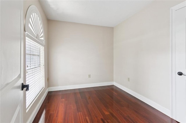 4000 Kawanee Ave, Metairie, LA 70002 - spare room with dark wood-style floors and baseboards