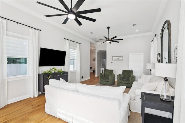 702 Pine St, Madisonville, LA 70447 - living area with a ceiling fan, light wood-type flooring, crown molding, and recessed lighting