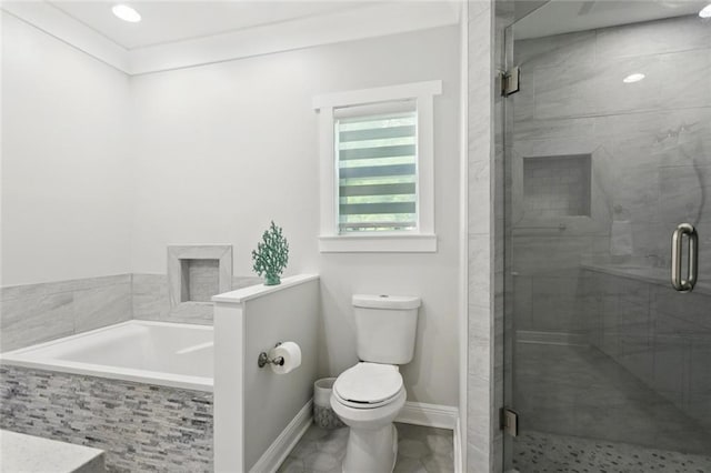 702 Pine St, Madisonville, LA 70447 - bathroom with a bath, a shower stall, and tile patterned floors