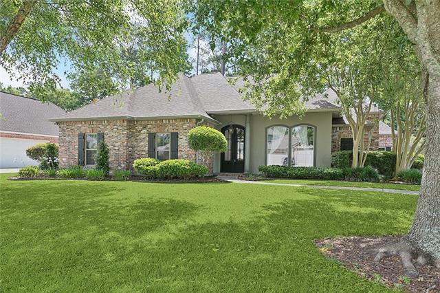 230 Delta Dr, Mandeville, LA 70448 - view of front of home with a front yard