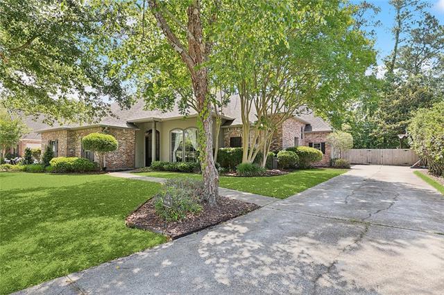 230 Delta Dr, Mandeville, LA 70448 - view of front of house with concrete driveway