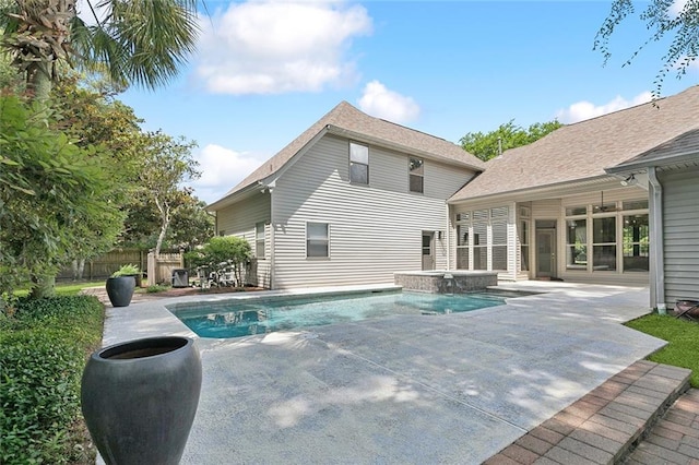 230 Delta Dr, Mandeville, LA 70448 - view of swimming pool featuring a patio area and a pool with connected hot tub