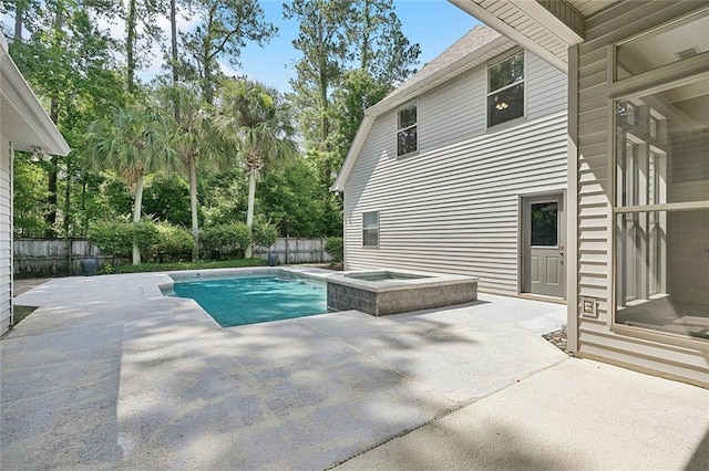 230 Delta Dr, Mandeville, LA 70448 - view of pool featuring a patio, a fenced backyard, and a pool with connected hot tub