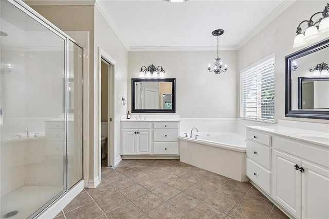 230 Delta Dr, Mandeville, LA 70448 - full bathroom with a stall shower, two vanities, a garden tub, a chandelier, and ornamental molding