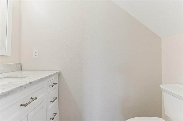 3028 Concordia Dr, La Place, LA 70068 - bathroom featuring vanity and lofted ceiling