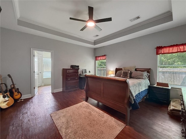 201 Stephanie Ln, Covington, LA 70435 - bedroom with a raised ceiling, wood finished floors, crown molding, ceiling fan, and ensuite bath