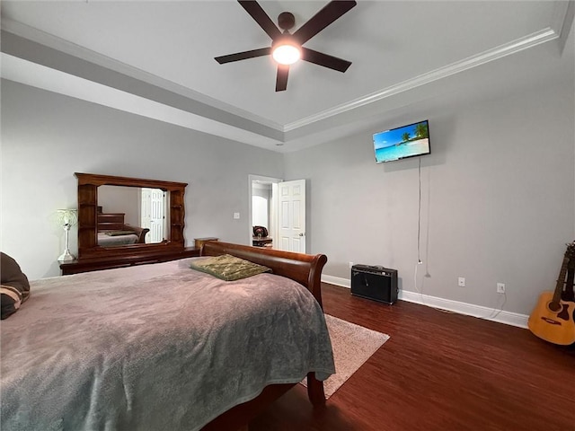 201 Stephanie Ln, Covington, LA 70435 - bedroom featuring wood finished floors, a raised ceiling, ornamental molding, and a ceiling fan