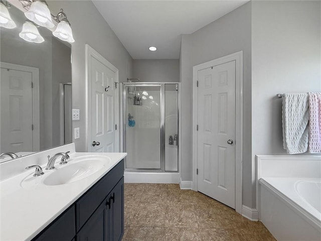 201 Stephanie Ln, Covington, LA 70435 - bathroom with a shower stall, vanity, and a bath