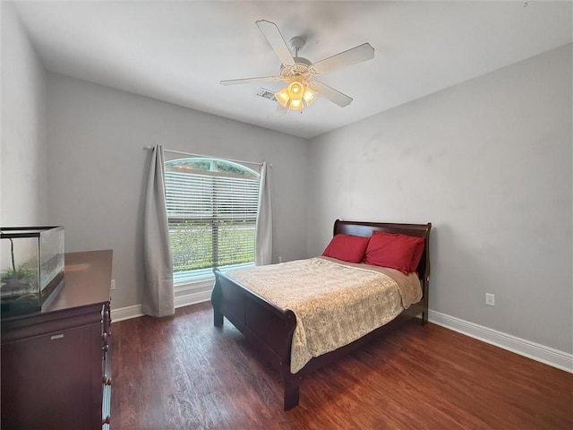 201 Stephanie Ln, Covington, LA 70435 - bedroom with wood finished floors and a ceiling fan