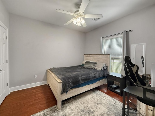 201 Stephanie Ln, Covington, LA 70435 - bedroom featuring wood finished floors, a ceiling fan, and an office area