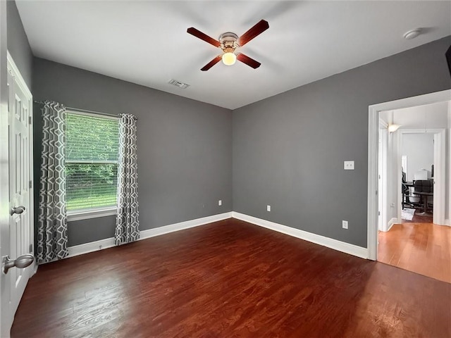201 Stephanie Ln, Covington, LA 70435 - spare room with ceiling fan, wood finished floors, and a smoke detector