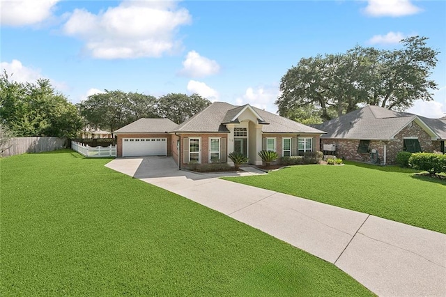 178 Colony Rd, Belle Chasse, LA 70037 - view of front facade featuring an attached garage, driveway, and brick siding