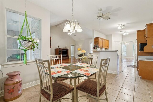 178 Colony Rd, Belle Chasse, LA 70037 - dining room featuring a chandelier, light tile patterned floors, and ceiling fan