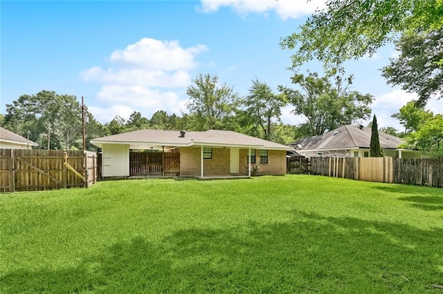 205 Timber Ridge Dr, Slidell, LA 70460 - rear view of property with a fenced backyard