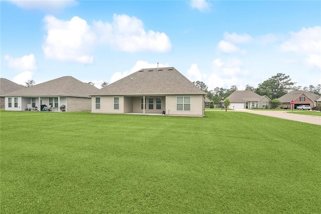 42030 Wood Ave, Ponchatoula, LA 70454 - back of house featuring a yard